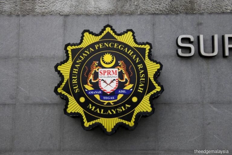 Six immigration officers among 12 arrested over Malaysian Immigration System hacking