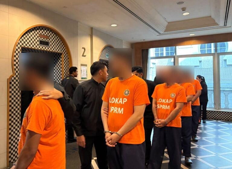 Immigration officers, cop among 12 nabbed over alleged MyIMMs hacking