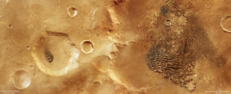 Mars Express Captures ‘Metallic’ Waves Rolling Across an Ancient Martian Crater