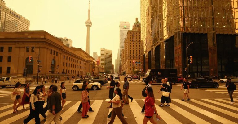 Smoke From Canada’s Wildfires Turns Skies Sickly Orange Across the Eastern US