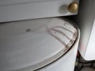 Silver Nitrate spill in bathroom, how do I safely remove stains?