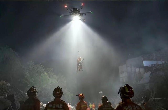 Flood victims in China being rescued by drone at night